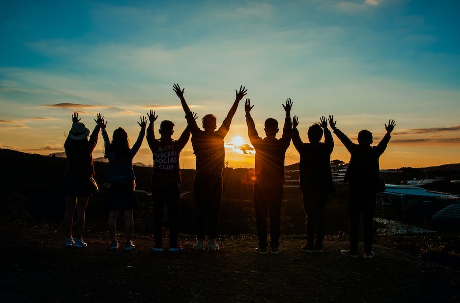 Image of a diverse group of people standing together, symbolizing the need for acceptance and empathy in mental health.