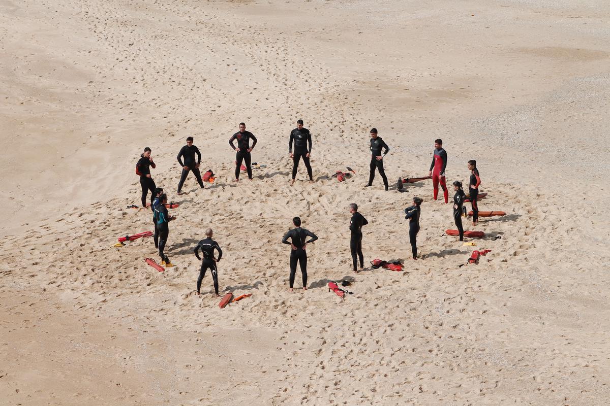 Image depicting a diverse group of individuals supporting each other in a circle, symbolizing mental health support